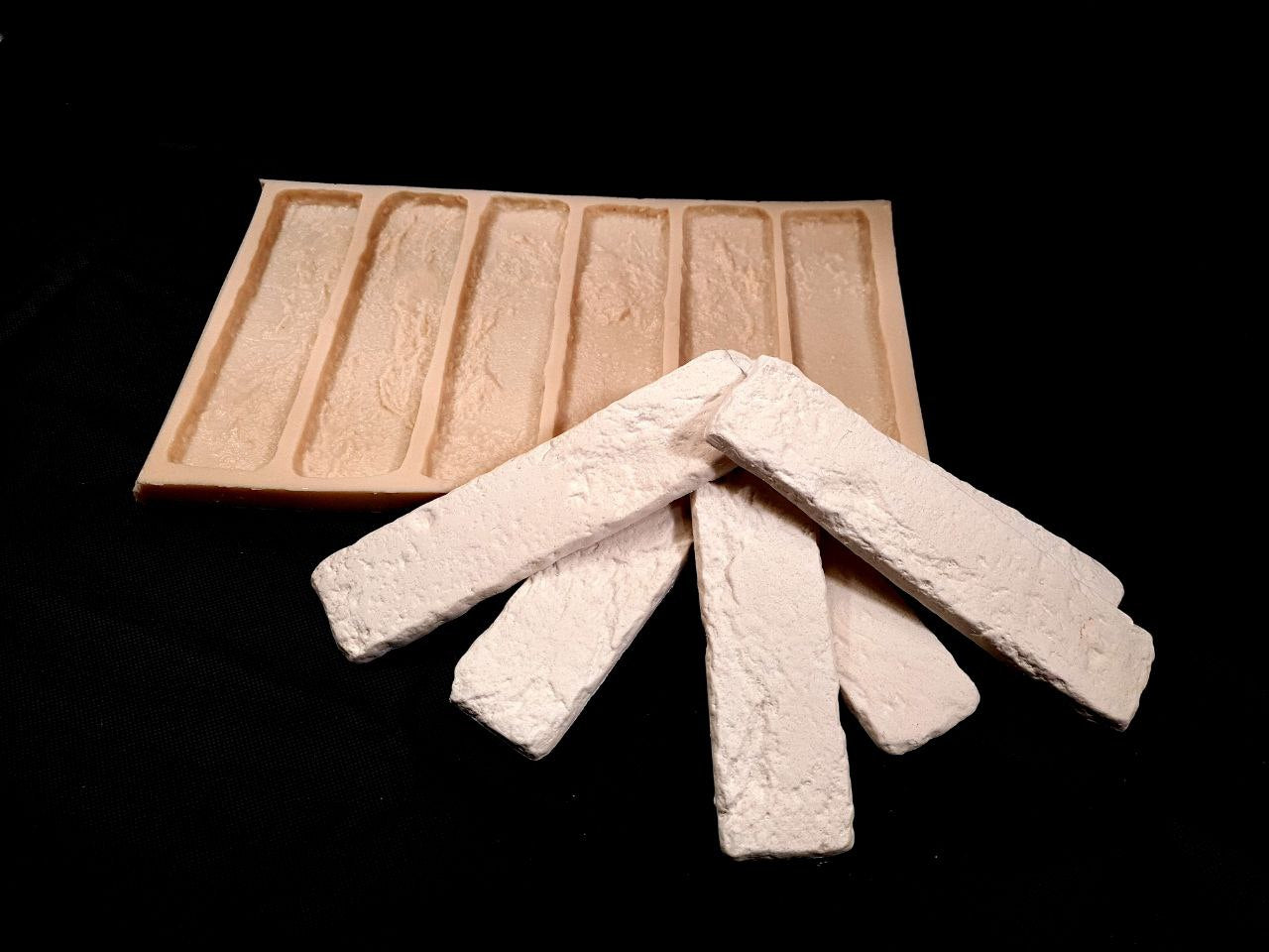 Handcrafted brick slips made using the Roman Half Mould – Ideal for decorative cladding and restorations.