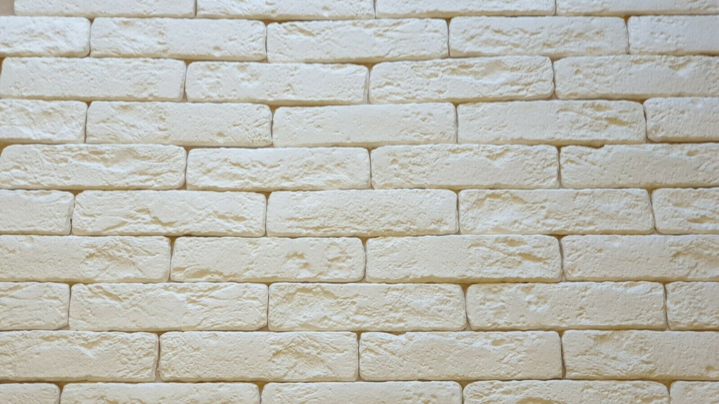 "White Roman-style brick slip wall – Classic textured finish for modern and traditional interiors.