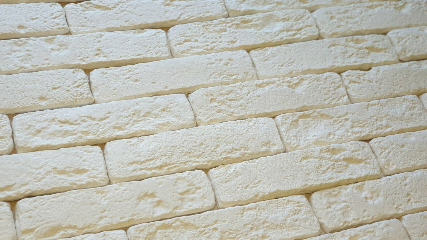 "White Roman-style brick slip wall – Classic textured finish for modern and traditional interiors.